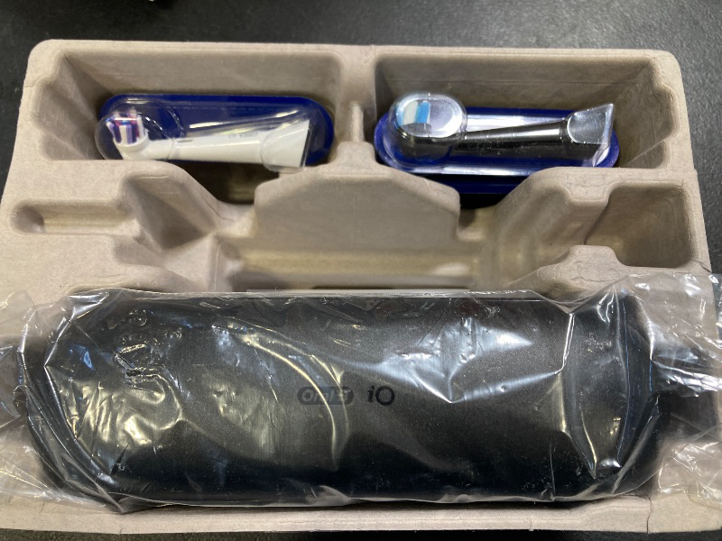 Photo 1 of Oral-B iO Deep Clean + Whiten Rechargeable Electric Toothbrush with Visible Pressure Sensor, 2 Minute Timer, 5 Cleaning Settings, 1 iO5 Limited, 3 Toothbrush Heads, Travel Case & Refill Holder, Black