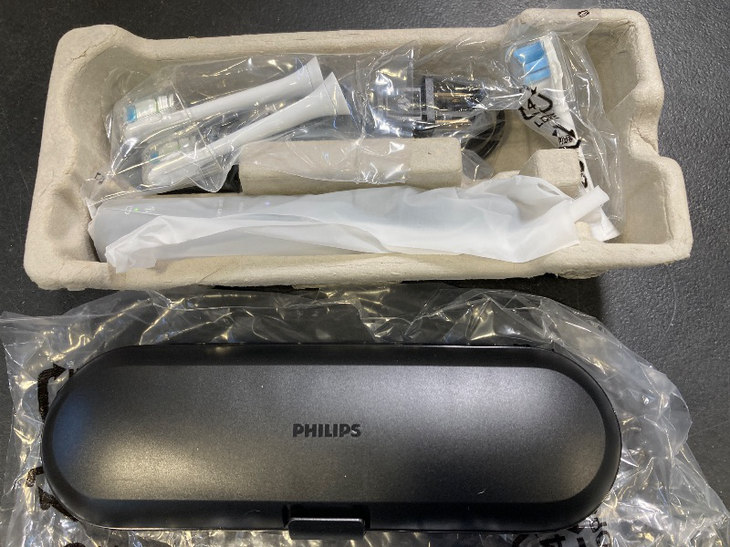 Photo 1 of Philips Sonicare ProtectiveClean 5300 Rechargeable Electric Toothbrush, with Pressure Sensor, 3 Cleaning Modes, SmarTimer and QuadPacer, with 2 Bonus Brush Heads, Travel Case, Black, Model HX6423/34
