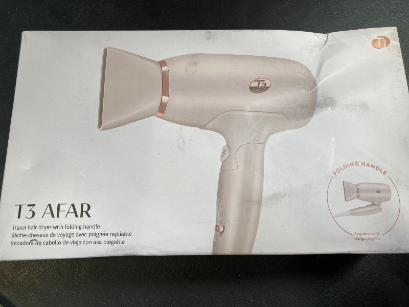 Photo 1 of T3 Afar Lightweight Travel-Size Hair Dryer with Auto Dual Voltage, Folding Handle, Fast Drying, Lightweight and Ergonomic, Frizz Smoothing, Multiple Heat and Speed Combinations