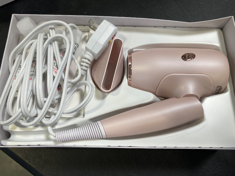 Photo 1 of T3 Afar Lightweight Travel-Size Hair Dryer with Auto Dual Voltage, Folding Handle, Fast Drying, Lightweight and Ergonomic, Frizz Smoothing, Multiple Heat and Speed Combinations