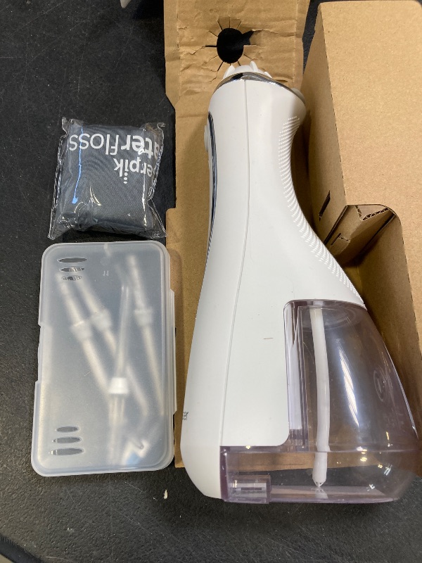 Photo 1 of Waterpik Cordless Advanced 2.0 Water Flosser For Teeth, Gums, Braces, Dental Care With Travel Bag and 4 Tips, ADA Accepted, Rechargeable, Portable, and Waterproof, White WP-580, Packaging May Vary