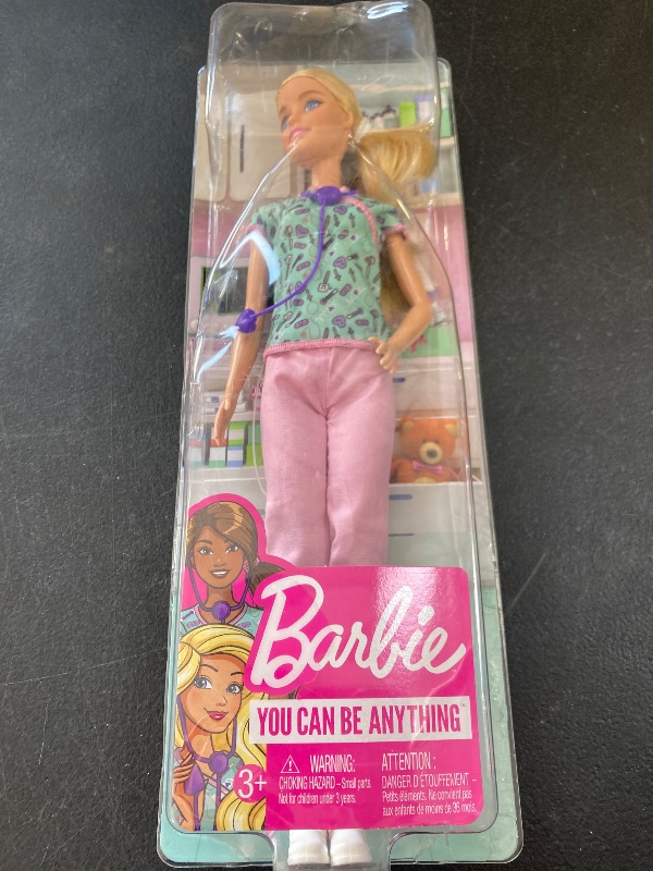 Photo 1 of Barbie Careers Fashion Doll & Accessory, Nurse Wearing Print Top, Pink Pants & White Shoes with Stethoscope
