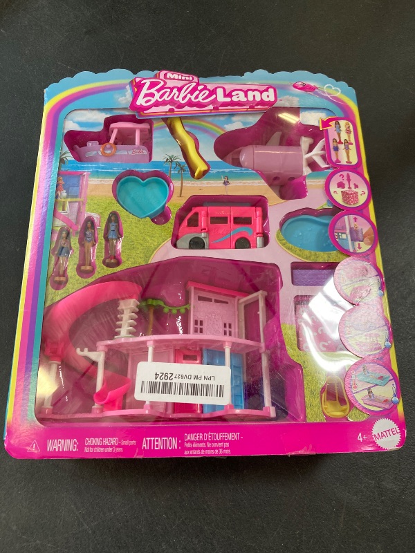 Photo 1 of Barbie Mini Barbie Land Dream House & 3-Vehicle Playset with 4 1.5-Inch Dolls, Doll House Furniture & Accessories, Includes DreamCamper, Boat & Plane