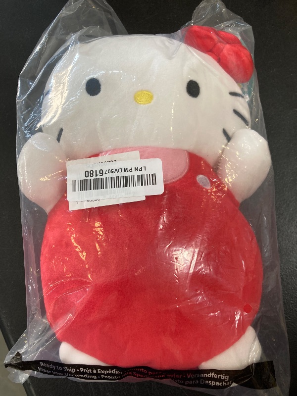 Photo 1 of Squishmallows Original Sanrio 10-Inch Hello Kitty in Red and Pink Overalls HugMees - Medium-Sized Ultrasoft Official Jazwares Plush