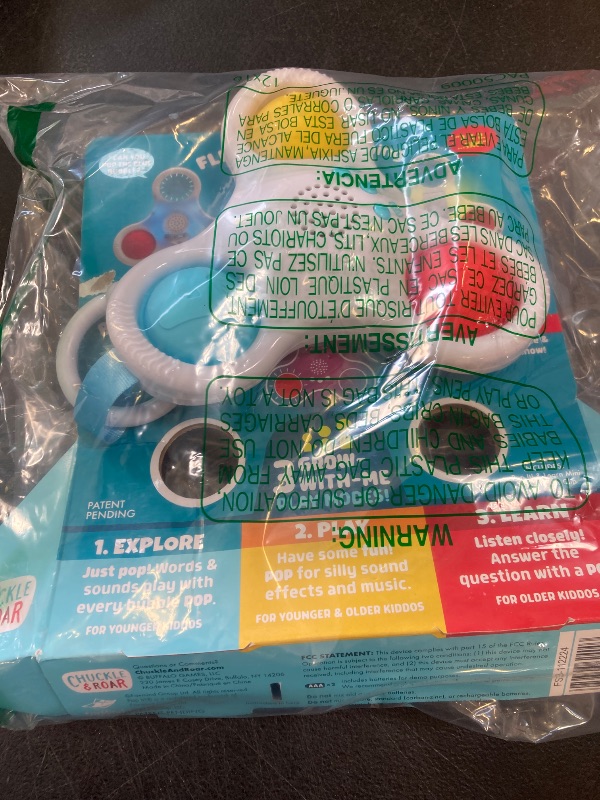 Photo 1 of Chuckle & Roar - Pop It! and Learn Mini - Educational and Electronic Popping Toy - Learn Numbers & Letters in Spanish or English - Great for Ages 6 Months to 2 Years