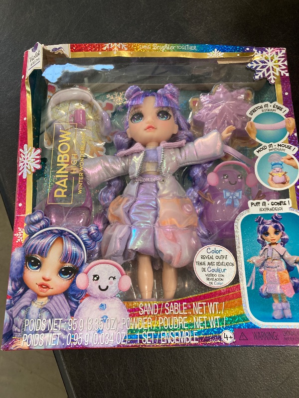 Photo 1 of Rainbow High Winter Wonderland Violet - Purple 11” Fashion Doll with Magic Snow Hidden in Fashion That Puffs Up with Water, and Snowman Kit, Great Gift for Kids 4-12 Years Old