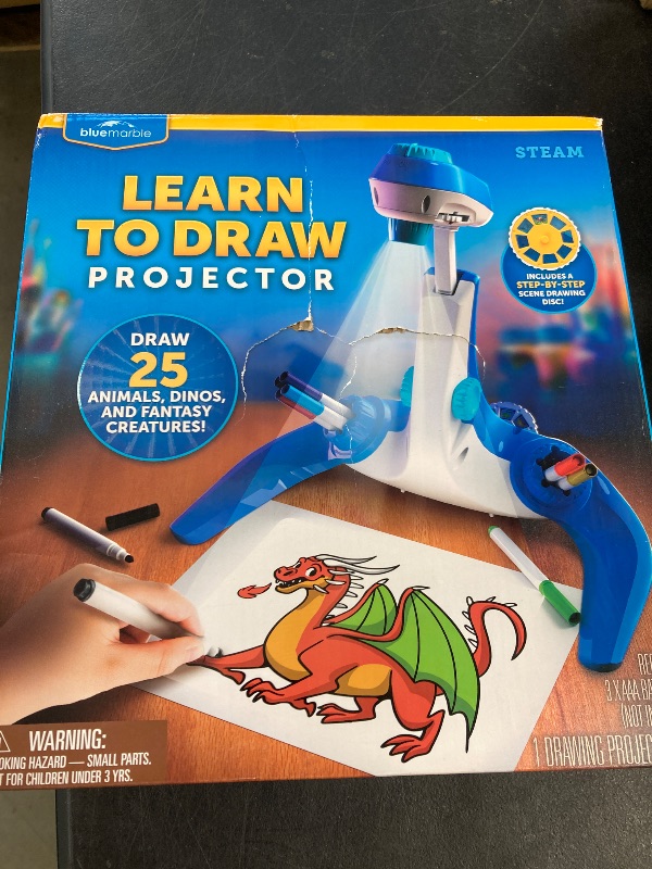 Photo 1 of Blue Marble Learn to Draw Projector - Kids Image Projector for Tracing with 9 Colorful Markers & 4 Image Discs with 25 Animals, Dinos & Creatures to Draw, Patent-Pending Drawing Projector for Kids