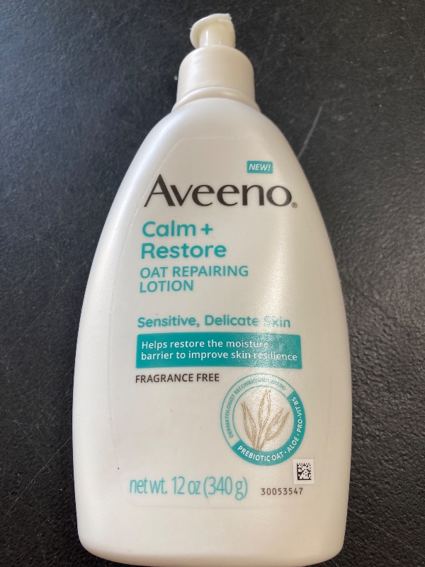 Photo 1 of Aveeno Calm + Restore Oat Repairing Body Lotion for Sensitive Skin, Daily Moisturizer with Prebiotic Oat, Aloe & Pro-Vitamin B5 Helps Restore Skin's Moisture Barrier, Fragrance Free, 12 oz
