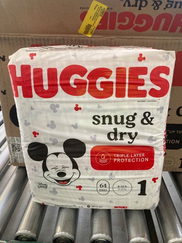 Photo 1 of Huggies Snug And Dry 64 Count, Size 1