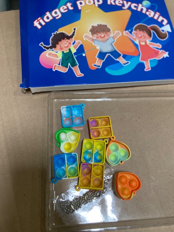 Photo 1 of ONKULL Pop Fidget Keychain It Mini Fidget Toys Bulk  Party Favors for Kids 4-8,8-12 Year Boys Girls Push Pops Bulk Toys Its Small Prizes for Kids Classroom Birthday Party Favors Bubble Poppers