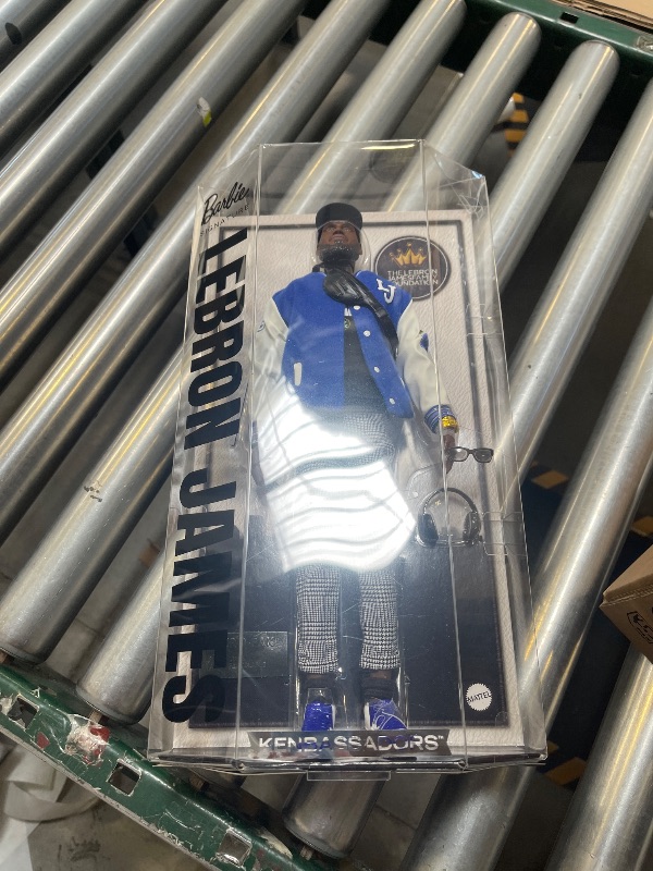 Photo 1 of Barbie Signature Lebron James Kenbassadors Doll Collectible with Varsity Bomber Jacket Outfit & Accessories Including Headphones, Sunglasses, & More