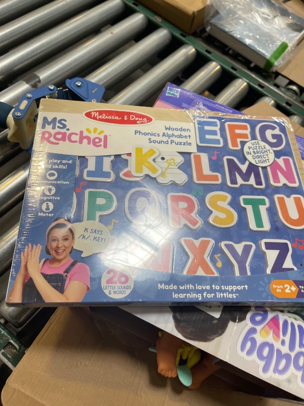 Photo 1 of Melissa & Doug® Ms. Rachel™ Wooden Phonics Alphabet Sound Puzzle with Light-Activated Sound Effects, 24-Piece Toddler Toys for Boys and Girls Ages 2+ Years