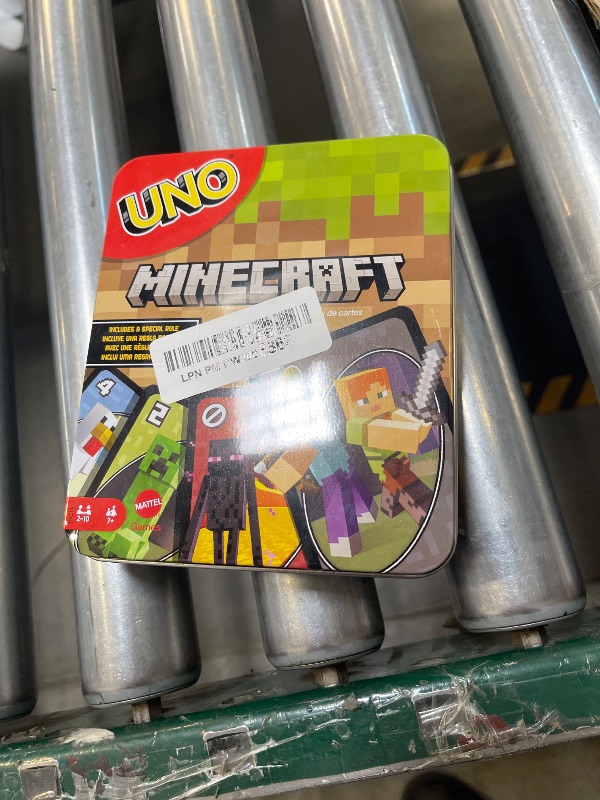 Photo 1 of Mattel Games UNO Minecraft Card Game for Family Night with Minecraft-themed Graphics in a Collectible Tin for 2-10 Players (Amazon Exclusive)   (CASE ONLY)