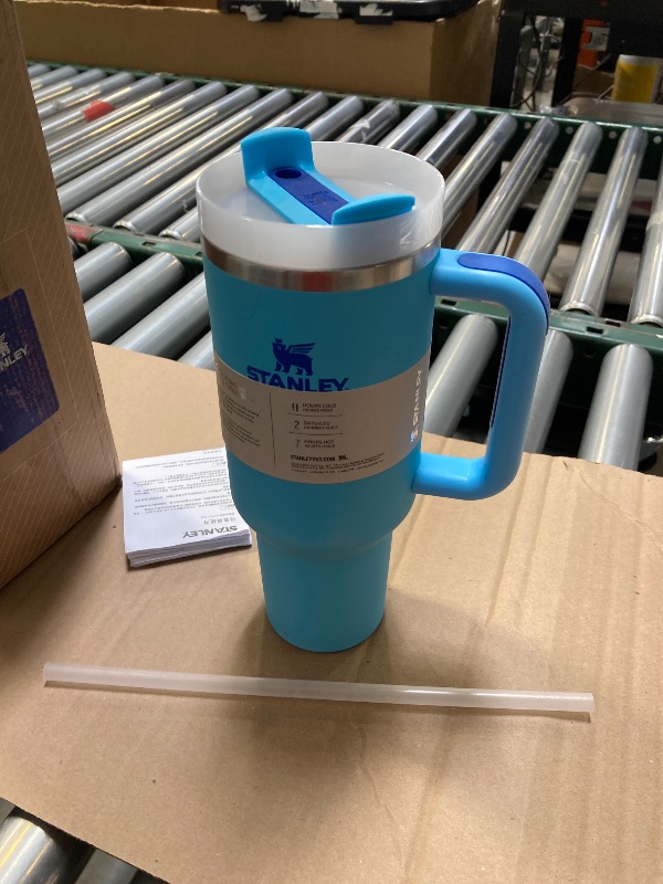 Photo 1 of Stanley Quencher H2.0 Tumbler with Handle and Straw 40 oz | Flowstate 3-Position Lid | Cup Holder Compatible for Travel | Insulated Stainless Steel Cup | BPA-Free | Cream 2.0