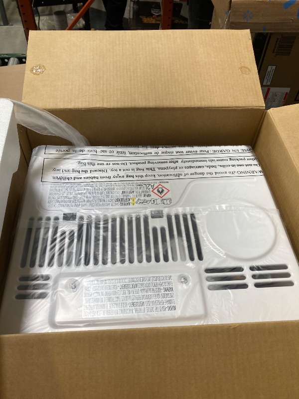Photo 1 of Midea 6 000 BTU 115V Window Air Conditioner with ComfortSense Remote up to 250 Sq Ft Coverage Area White MAW06R1WWT-T
