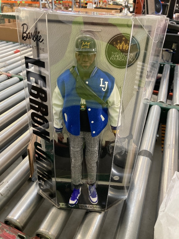 Photo 1 of Barbie Signature Lebron James Kenbassadors Doll Collectible with Varsity Bomber Jacket Outfit & Accessories Including Headphones, Sunglasses, & More