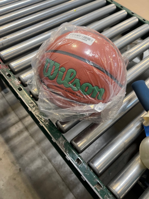 Photo 1 of WILSON Evolution Indoor Game Basketball, Green, Size 6 - 28.5"