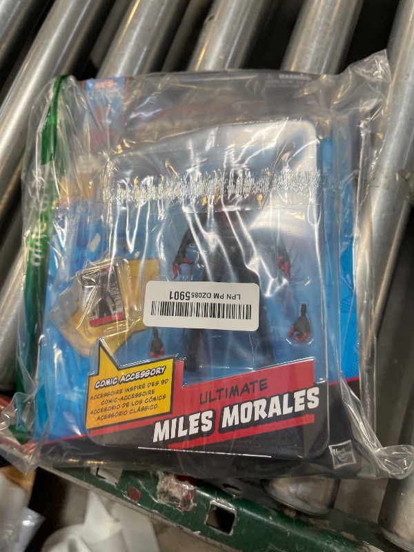 Photo 1 of Marvel Legends Series Ultimate Miles Morales, Spider-Man Comics-Inspired Collectible 6-Inch Scale Action Figure with Character-Sized Comic Accessory