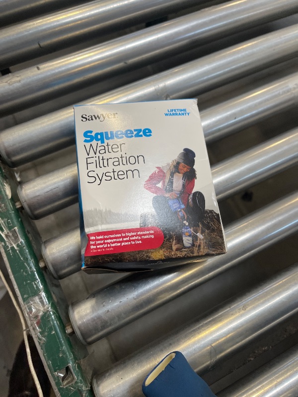 Photo 1 of Sawyer Products SP129 Squeeze Water Filtration System w/ Two 32-Oz Squeeze Pouches, Straw, and Hydration Pack Adapter