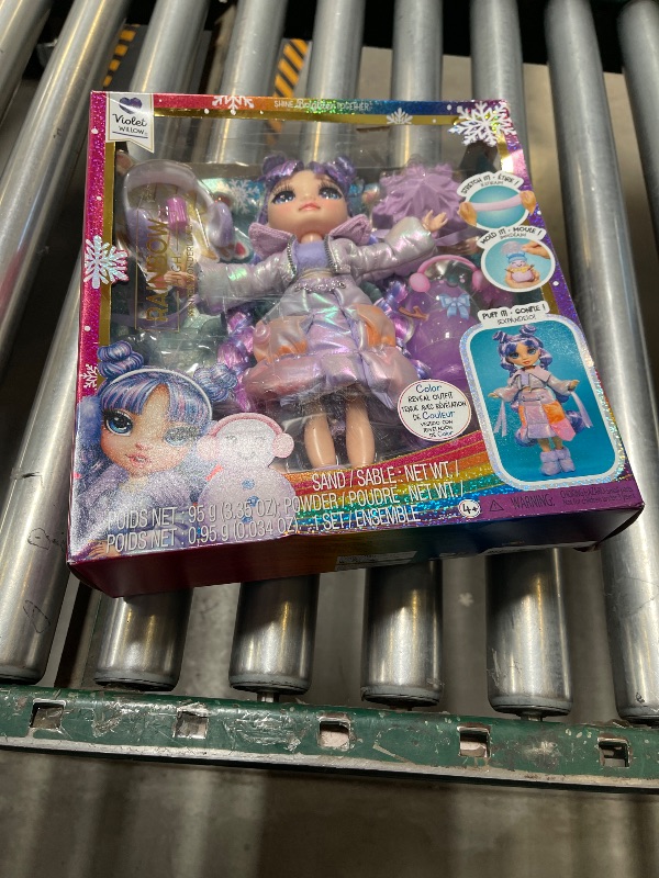 Photo 1 of Rainbow High Winter Wonderland Violet - Purple 11” Fashion Doll with Magic Snow Hidden in Fashion That Puffs Up with Water, and Snowman Kit, Great Gift for Kids 4-12 Years Old