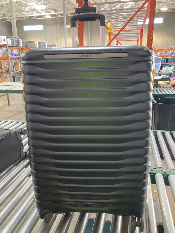 Photo 1 of Samsonite Rolling Suitcase 30"