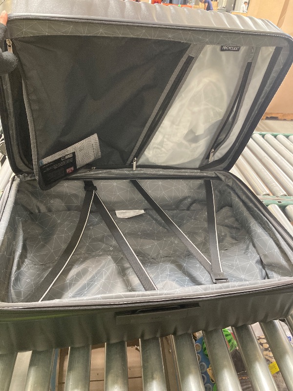 Photo 1 of Samsonite Rolling Suitcase 30"