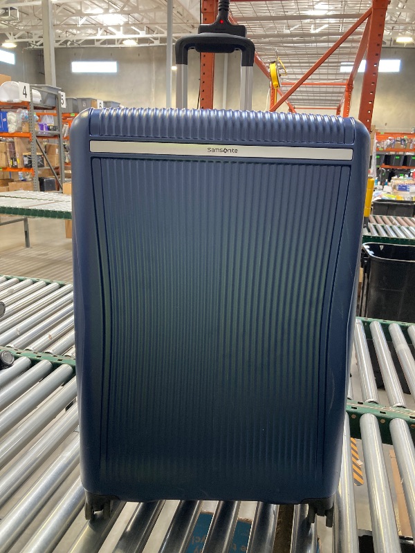 Photo 1 of Samsonite Rolling Suitcase 30"