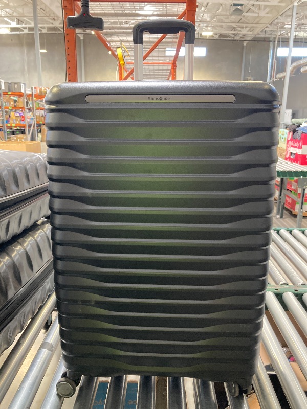 Photo 1 of Samsonite Rolling Luggage 30"