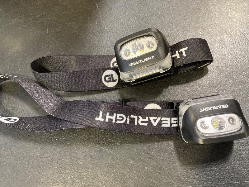 Photo 1 of GearLight 2Pack LED Headlamp - Outdoor Camping Head Lamps with Adjustable Headband - Lightweight Battery Powered Bright Flashlight Headlight with 7 Modes and Pivotable Head and Red Light