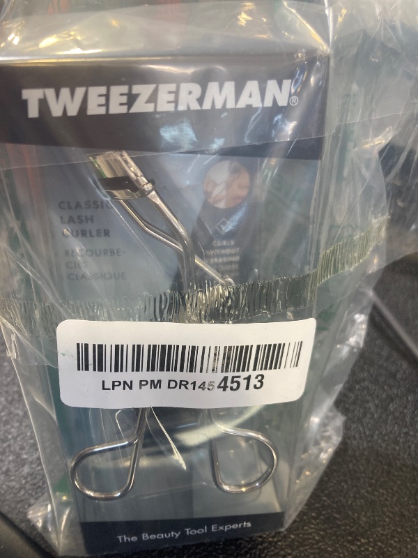 Photo 1 of Tweezerman Classic Eyelash Curler Model No. 1034-R, Stainless Steel