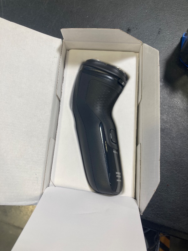 Photo 1 of Philips Norelco Shaver 2400 Series, Wet and Dry Electric Shaver, Pop-up Trimmer, P-Cap, Deep Black, Model X3001/90