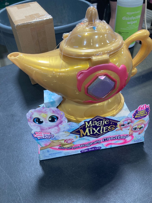 Photo 1 of Magic Mixies Magic Genie Lamp with Interactive 8" Pink Plush Toy and 60+ Sounds & Reactions. Unlock a Magic Ring and Reveal a Pink Genie from The Real Misting Lamp. Gifts for Kids, Ages 5+