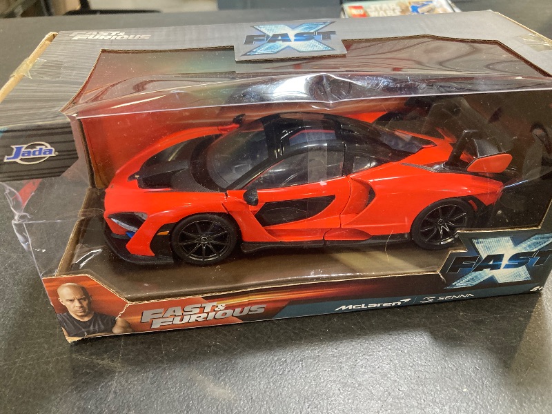 Photo 1 of Jada Toys McLaren Senna - Fast & Furious 1:24 Scale Die-Cast Vehicle – Detailed Interior, Opening Hood, Doors, and Trunk – Collectible Model Car for Ages 8+ - Orange/Black