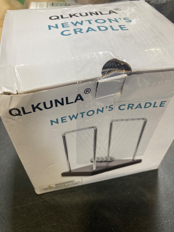 Photo 1 of QLKUNLA Newtons Cradle Balance Balls Science Physics Gadget Desktop Decoration Kinetic Motion Toy for Home and Office