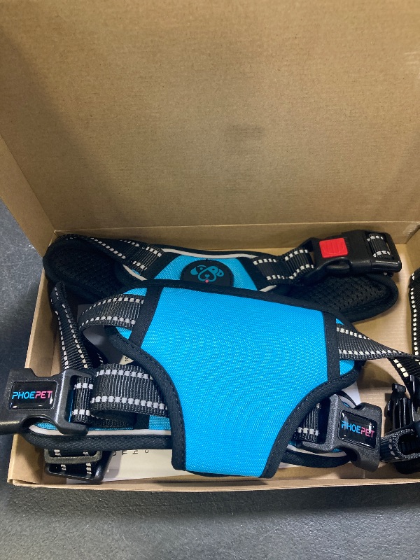 Photo 1 of PHOEPET No Pull Dog Harness Medium Reflective Front Clip Vest with Handle,Adjustable 2 Metal Rings 3 Buckles,[Easy to Put on & Take Off](M, Blue)