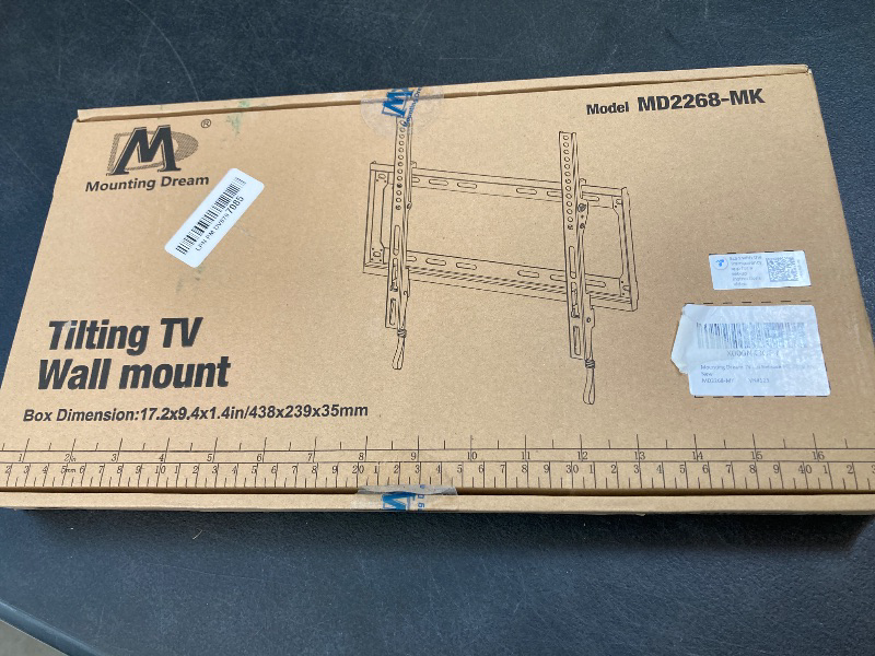 Photo 1 of Mounting Dream Tilting TV Mounts for Most 26-60 Inch LED, LCD TVs up to VESA 400 x 400mm and 88 LBS Loading Capacity, TV Wall Mount with Unique Strap Design for Easily Lock and Release MD2268-MK