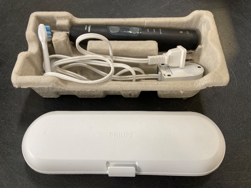Photo 1 of Philips Sonicare Protective Clean 5300 Rechargeable Electric Toothbrush, with Pressure Sensor, 3 Cleaning Modes, SmarTimer and QuadPacer, with 2 Bonus Brush Heads, Travel Case, Black, Model HX6423/34