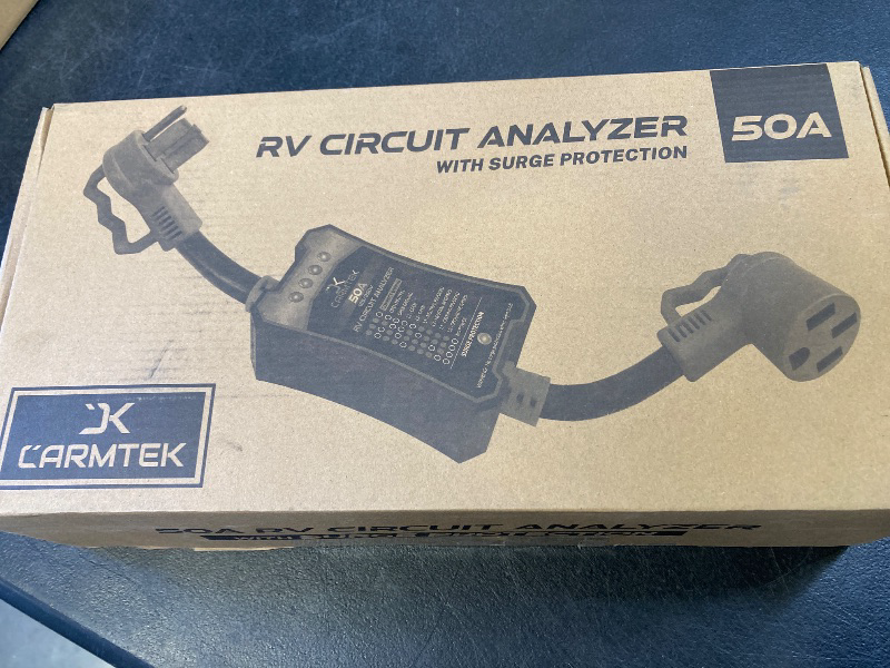 Photo 1 of CARMTEK RV Surge Protector 50 Amp - RV Circuit Analyzer with Integrated Surge Protection - Smart 50 Amp Surge Voltage Defender with Grip Handles