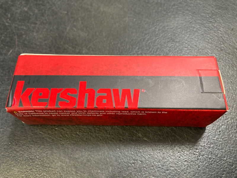 Photo 1 of Kershaw XCOM Military-Style Pocketknife; 3.6-inch Black-Oxide Coated Blade and 8Cr13MoV Steel, Spearpoint Blade, Sharpened One Side, and Glass Filled Nylon Handle, Manual Open, Reversible Pocketclip