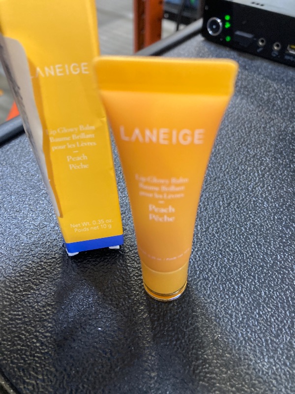 Photo 1 of LANEIGE Lip Glowy Balm Peach: Hydrate, Glossy, Lightweight, Moisturize & Tint with Shea Butter