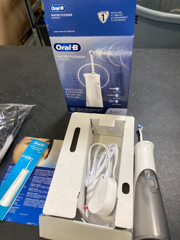 Photo 1 of Oral-B Water Flosser Advanced, Cordless Portable Oral Irrigator Handle with 2 Nozzles