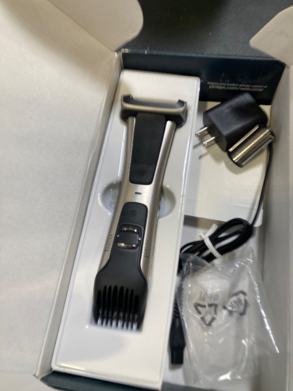 Photo 1 of Philips Norelco Bodygroom 7000 Series, Showerproof Groin and Body Trimmer for Men, Precise Body Grooming, Adjustable Comb, Safe Even Below The Belt, 80 Min. Runtime, Model BG7030/49