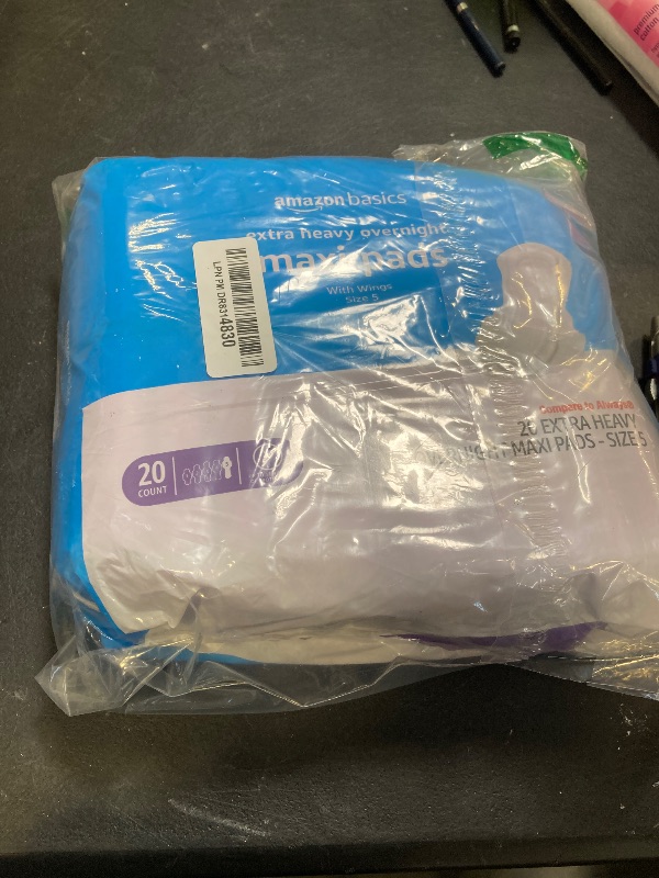Photo 1 of Amazon Basics Thick Maxi Pads with Wings for Periods - Extra Heavy Overnight Absorbency, Unscented, Size 5, 20 Count (Previously Solimo)