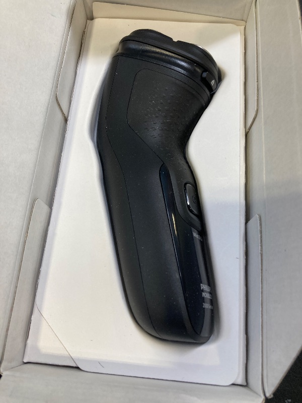 Photo 1 of Philips Norelco Shaver 2400 Series, Wet and Dry Electric Shaver, Pop-up Trimmer, P-Cap, Deep Black, Model X3001/90