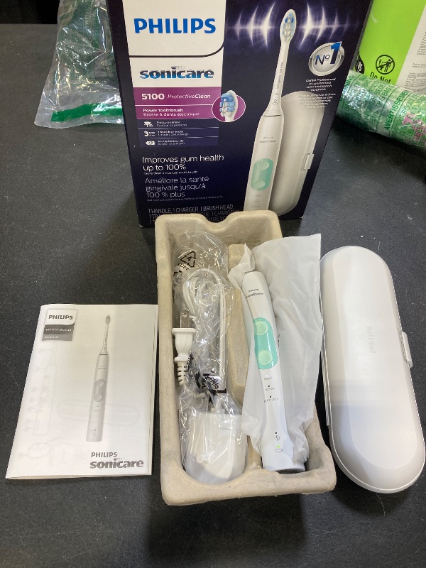 Photo 1 of Philips Sonicare ProtectiveClean 5100 Rechargeable Electric Toothbrush, with Pressure Sensor, 3 Cleaning Modes, SmarTimer and QuadPacer, 14-Day Battery Life, Travel Case, White, Model HX6857/11