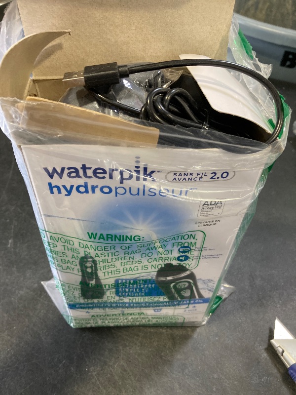 Photo 1 of Waterpik Cordless Advanced 2.0 Water Flosser For Teeth, Gums, Braces, Dental Care With Travel Bag and 4 Tips, ADA Accepted, Rechargeable, Portable, and Waterproof, Black WP-582, Packaging May Vary