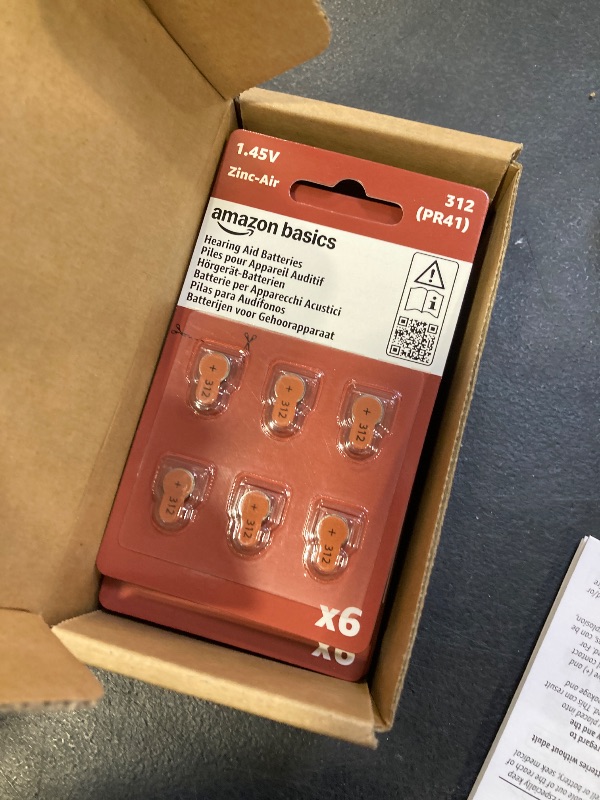Photo 1 of Amazon Basics 60-Pack Hearing Aid Size 312 Zinc-Air Batteries, 1.45 Volt, Brown Tab, 4-Year Shelf Life, Child-Safe Package (Use Scissors to Open)