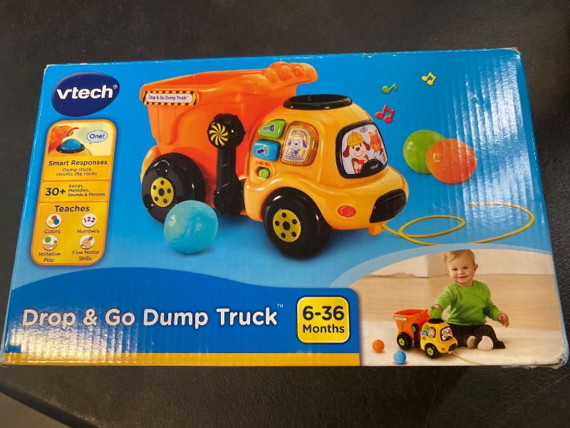 Photo 1 of VTech Drop and Go Dump Truck, Orange