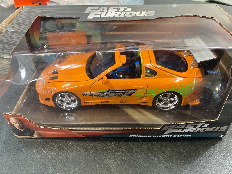 Photo 1 of Jada Toys Fast & Furious 1:24 Brian's Toyota Supra Die-cast Car, toys for kids and adults, Orange (97168)