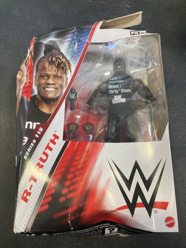 Photo 1 of Mattel WWE Elite Action Figure & Accessories, Series #115 6-inch Collectible R-Truth with 25 Articulation Points & Swappable Hands